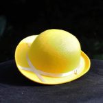 De gele hoed - zonnig en positief